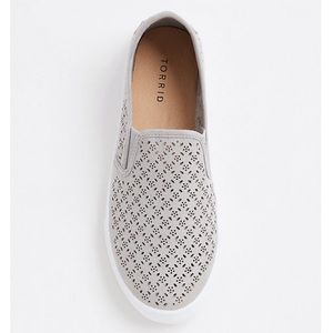 TORRID GREY SLIP-ON FAUX SUEDE LASER CUT SNEAKER.